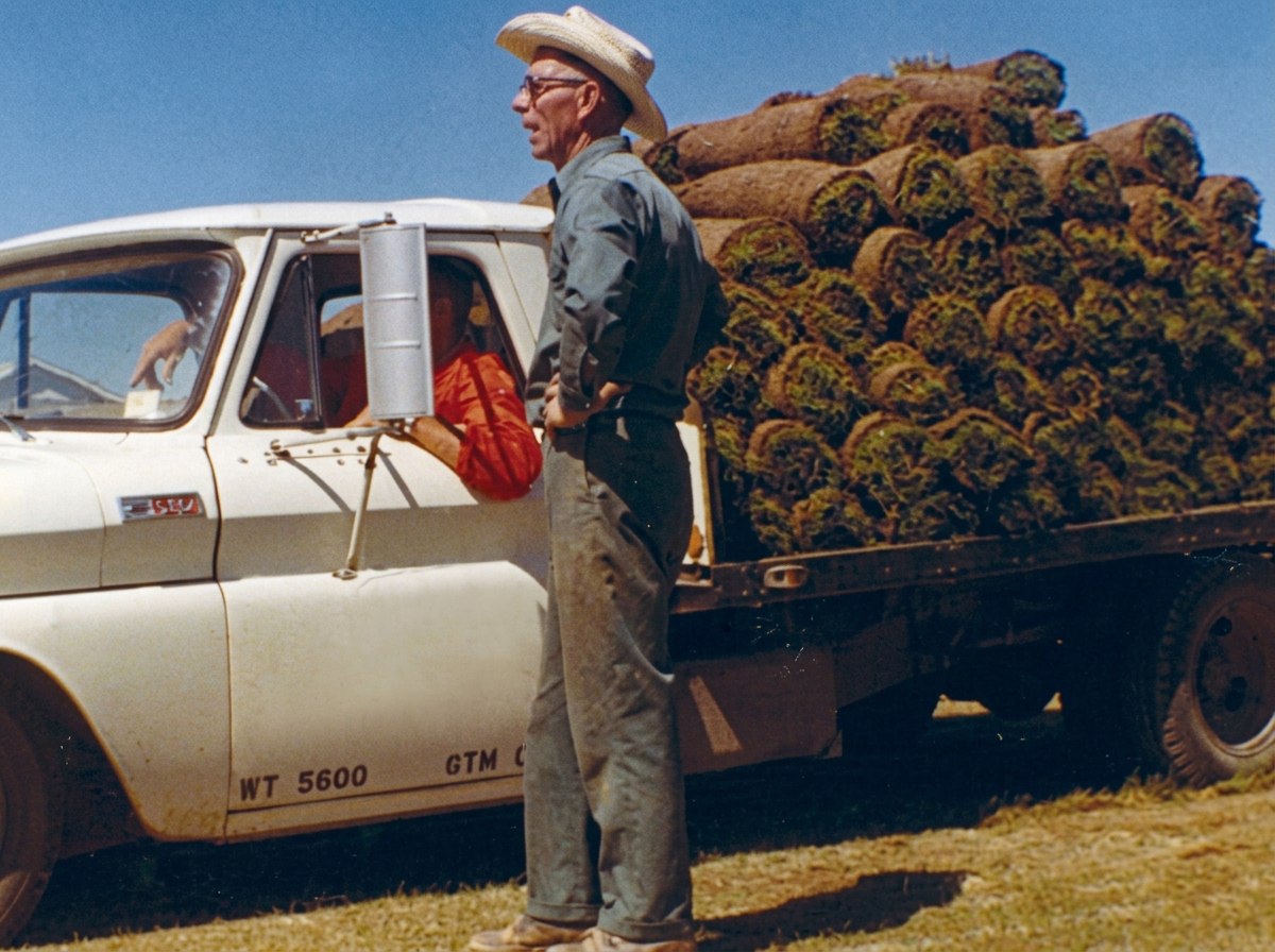 John plants the first field.